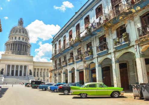 El Capitolio met oldtimers in Havana Cuba El Capitolio met oldtimers in Havana Cuba